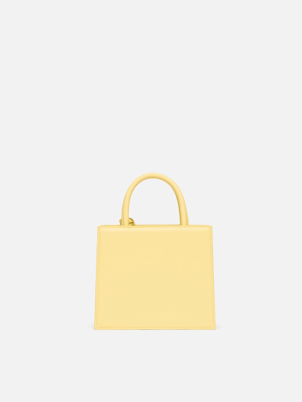 Borsa Shop mini strutturata in pelle liscia giallo tenue con targhetta metallica